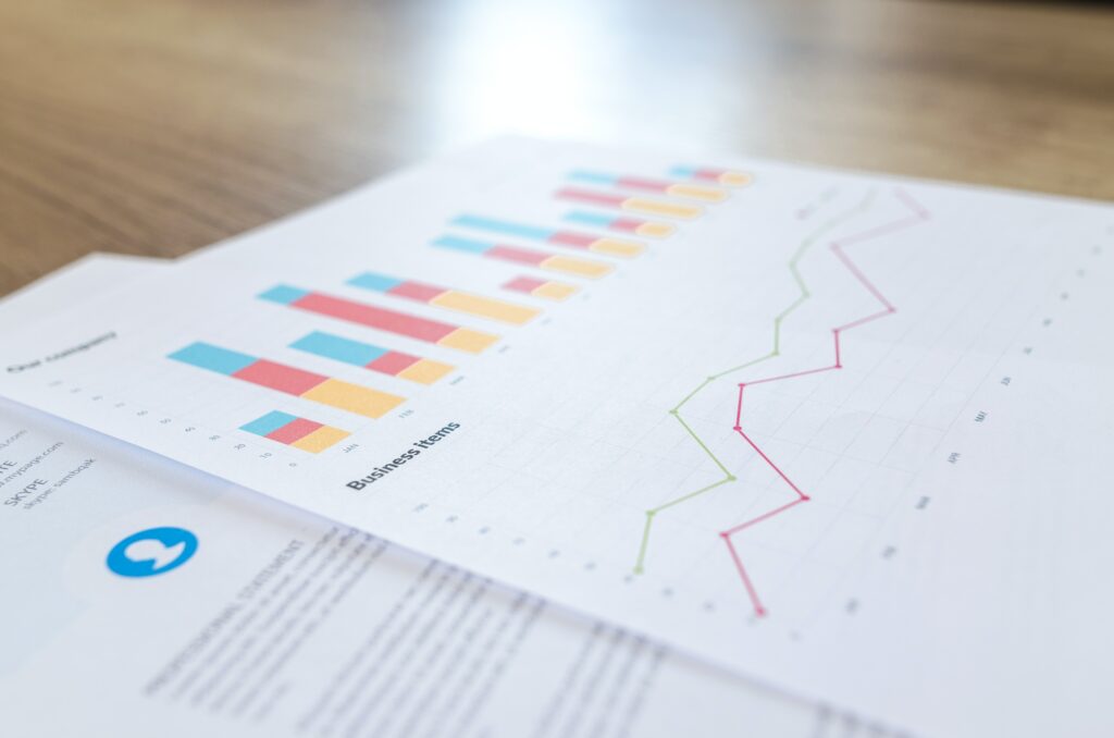 Business performance charts printed on paper